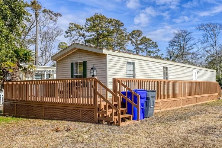 Wooden Lattice Skirting beneath Wrap-Around Deck Structure