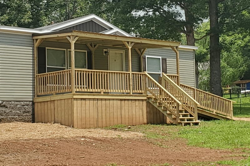Wooden Porch with Accessible Ramp and Gabled Roof