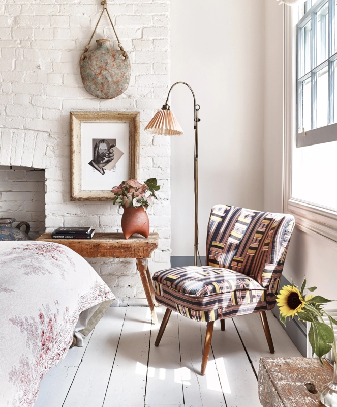 Accent Chair for Bedroom: Vibrant Patterned Upholstery & Brass Lamp