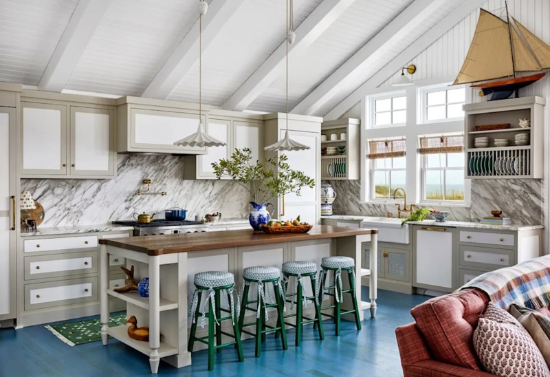 Airy Coastal Kitchen with Blue Painted Floor and Marble Backsplash