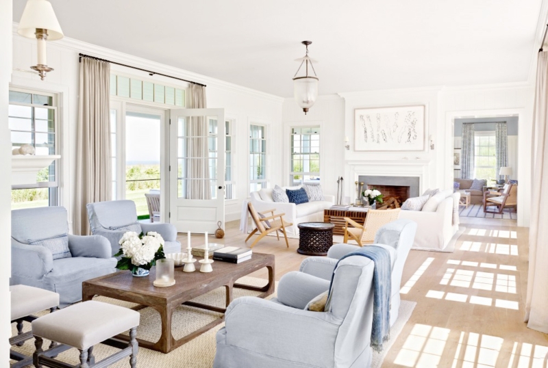 Airy Coastal Living Room Layout with Lantern Lighting and Fireplace