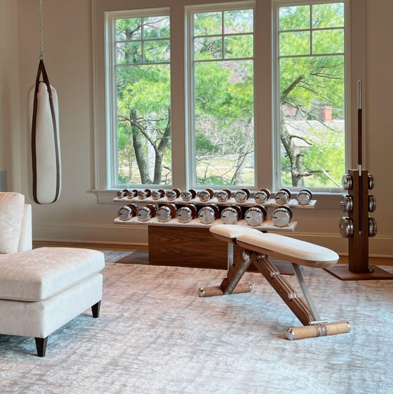 Airy Luxury Home Gym With Wood And Chrome Equipment Styling