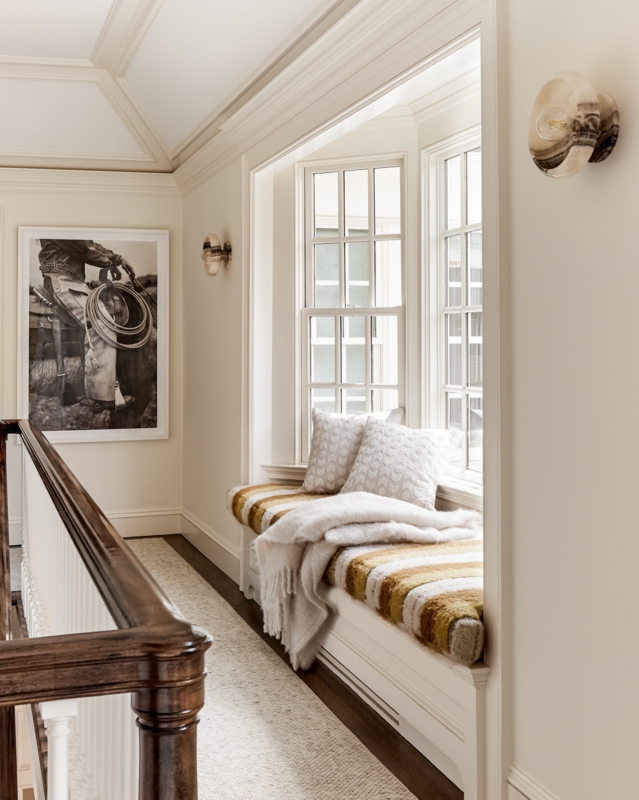 Alabaster Style Sconces Window Seat with Mustard Striped Cushion.