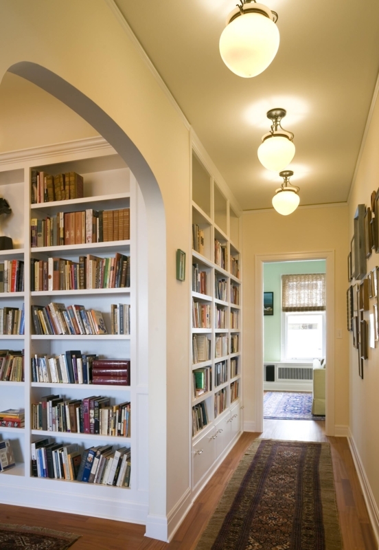 Arched Architecture Hallway Library featuring Warm Globe Lights