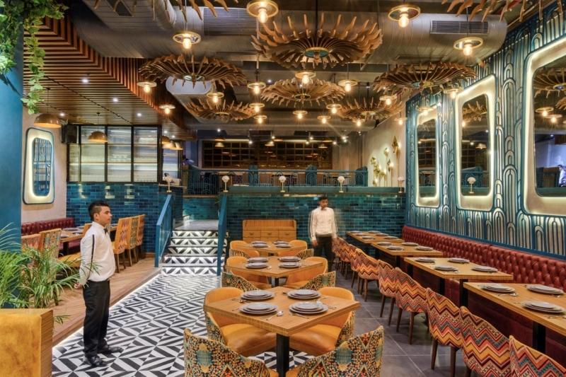 Art Deco Restaurant Design: Floral Wooden Chandeliers & Teal Tile