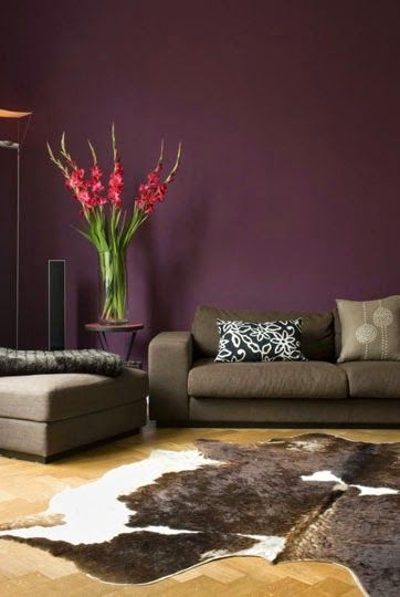 Aubergine Accent Wall Living Room with Cowhide Rug Styling