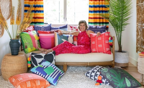 Bamboo Loveseat with Maximalist Boho Pillow Styling and Shag Rug