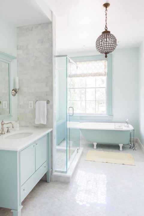 Bathroom with Crystal Globe Chandelier, Marble Hex Floor and Tub