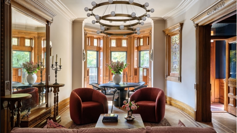 Bay Window Dining Nook With Burgundy Accent Chairs And Stained Glass