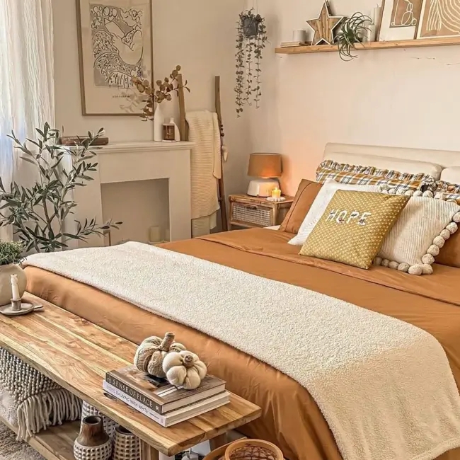 Bed with Pom Pom Pillow and Wooden Bench for Cozy Styling