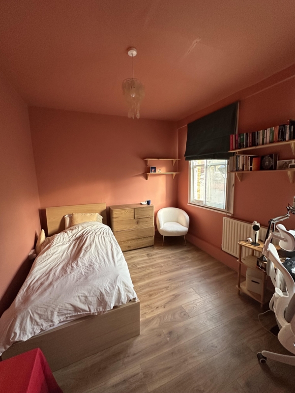 Bedroom Minimalist Style with Wood Furniture and Boucle Chair