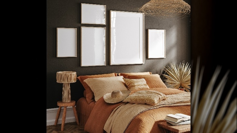 Bedroom Moody Style with Dark Accent Wall and Gallery Frames