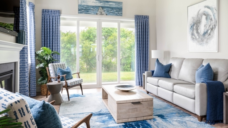 Blue and White Coastal Living Room with Sliding Glass Doors