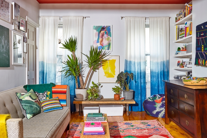 Blue Ombre Curtain Living Room with Layered Rug and Textile Design