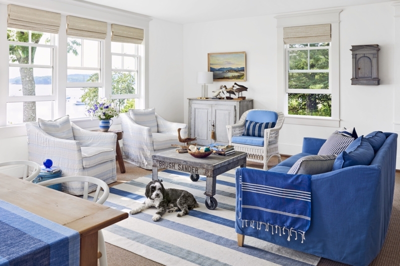 Blue Slipcovered Sofa and Striped Rug in Coastal Living Room