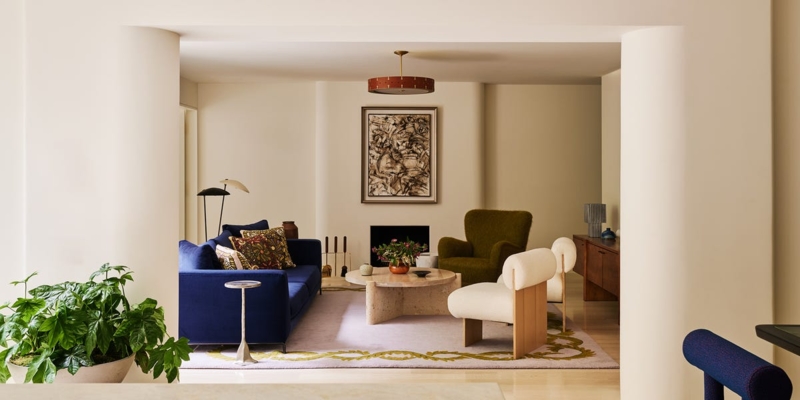 Blue Velvet Sofa With Bouclu00e9 Chairs In Curved Wall Architectural Details