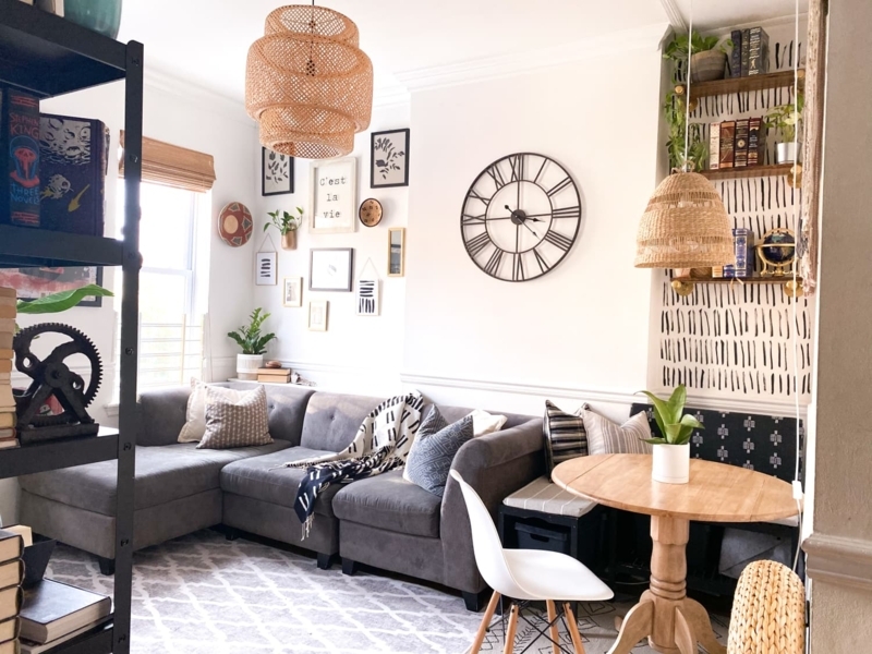 Bohemian Dining Nook with Woven Pendant Shades and Gallery Wall