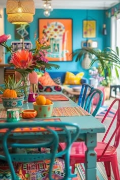 Bohemian Dining Room with Bold Turquoise Walls and Metal Chairs