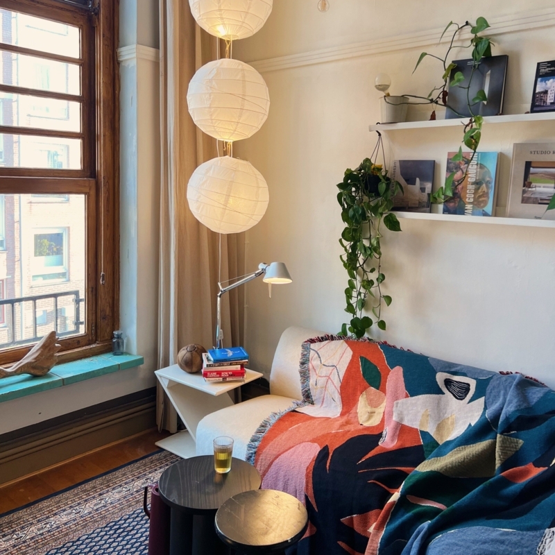 Bohemian Reading Nook with Stacked Paper Lanterns