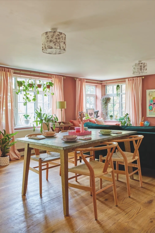 Boho Chic Dining Room with Stone Top Table and Wishbone Chairs