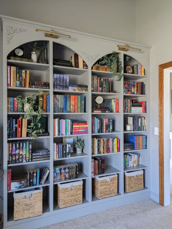 Bookcase: Light Gray with Arched Niches and Brass Lighting