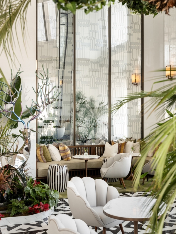 Botanical Lounge: Scalloped Accent Chairs, Geometric Patterned Floor