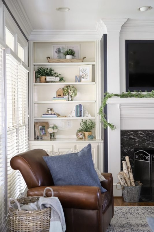 Built-in Bookshelf: Cozy Reading Corner with a Leather-like Armchair.