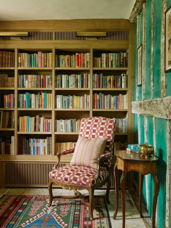 Built-in Bookshelf: Teal Wall Library Ideas with Ikat Accent Chair