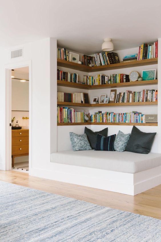Built-in Bookshelf: Warm Wood L-Shaped Shelves in a Cozy Reading Nook
