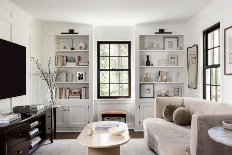 Built-in Bookshelves: Cream with Symmetrical Styling and Window