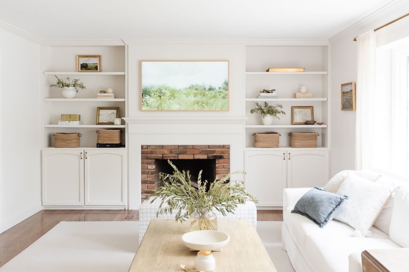 Built-in Bookshelves: Symmetrical Layout framing a Brick Fireplace.