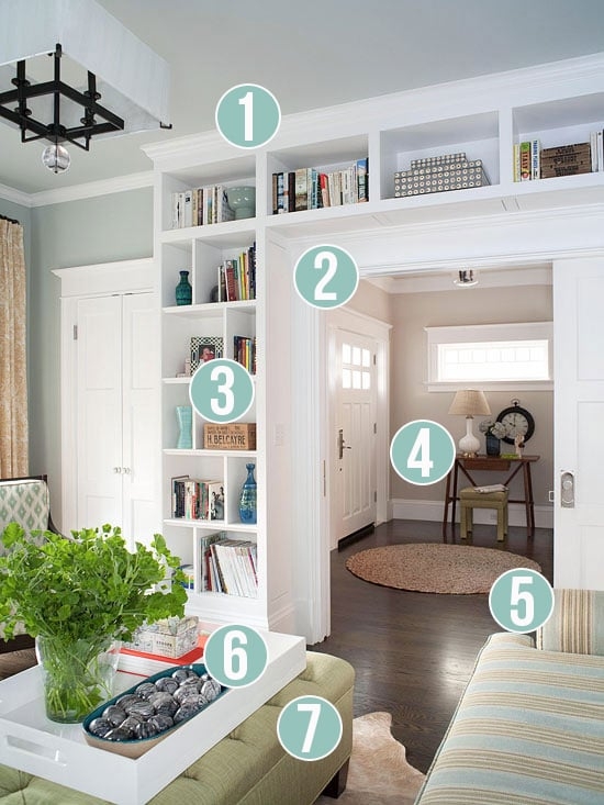 Built-in Shelving: White Wrap-Around Unit Framing a Doorway.