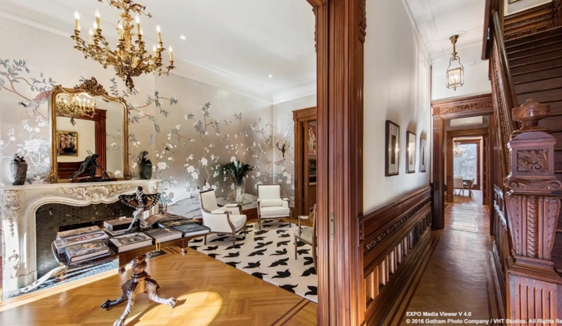 Chinoiserie Wallpaper Accent Wall With Ornate White Marble Fireplace