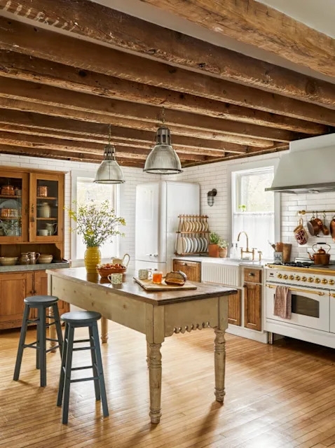 Classic Farmhouse Kitchen with Heavy Beams and White Appliances