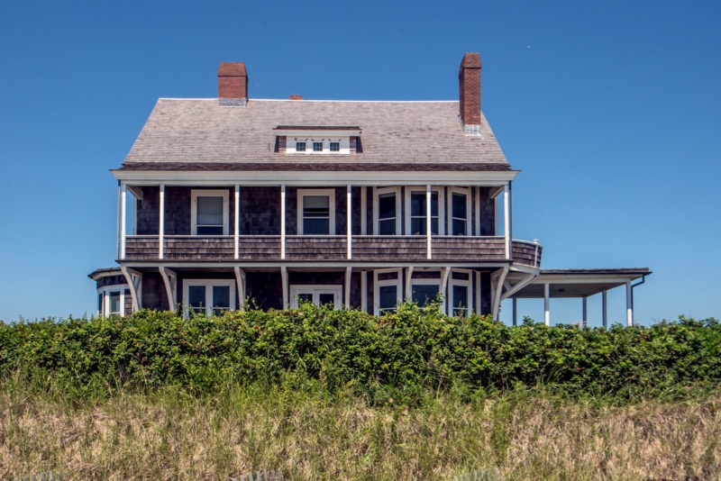 Classic Shingle Style Beach Cottage with Prominent Brick Chimneys