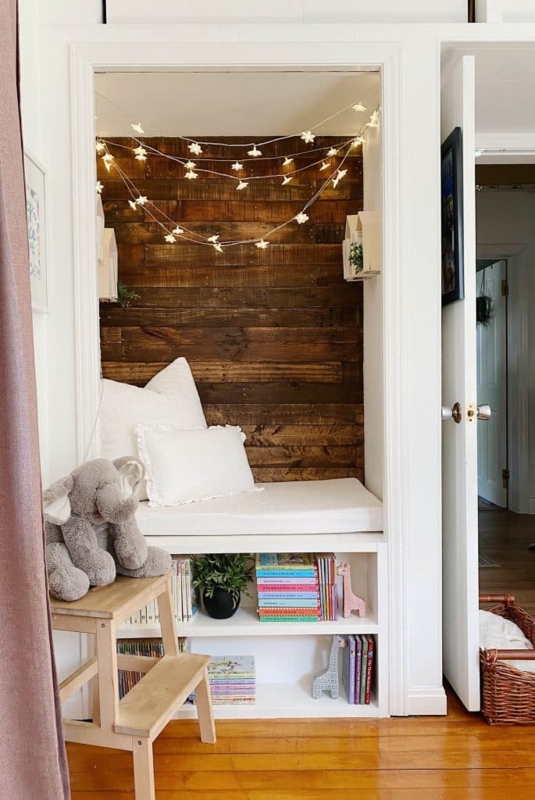 Closet Reading Nook conversion with star string lights.