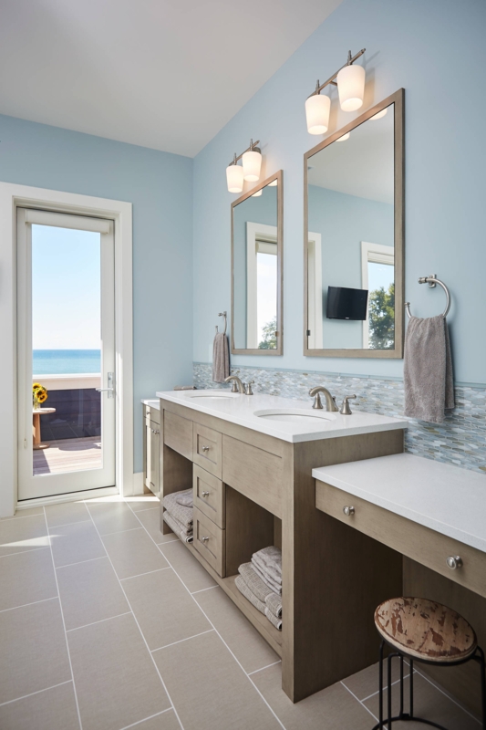 Coastal Bathroom featuring Weathered Wood Vanity and Ocean View Access