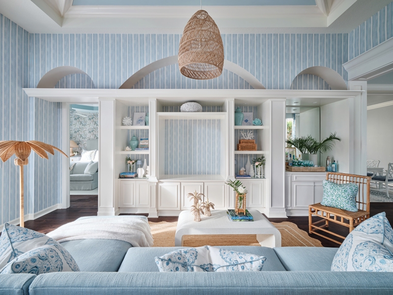 Coastal Chic Living Room with Arched Built-ins and Woven Pendant