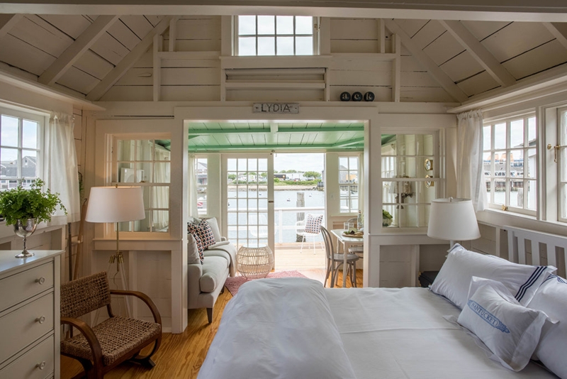 Coastal Cottage Bedroom with Waterfront View and Mint Green Ceiling