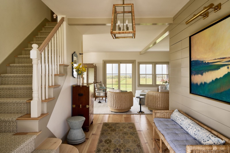 Coastal Entryway with Patterned Stair Runner and Woven Barrel Chairs