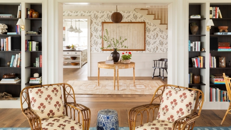 Coastal Hallway with Vintage Map Art and Rattan Accent Chairs