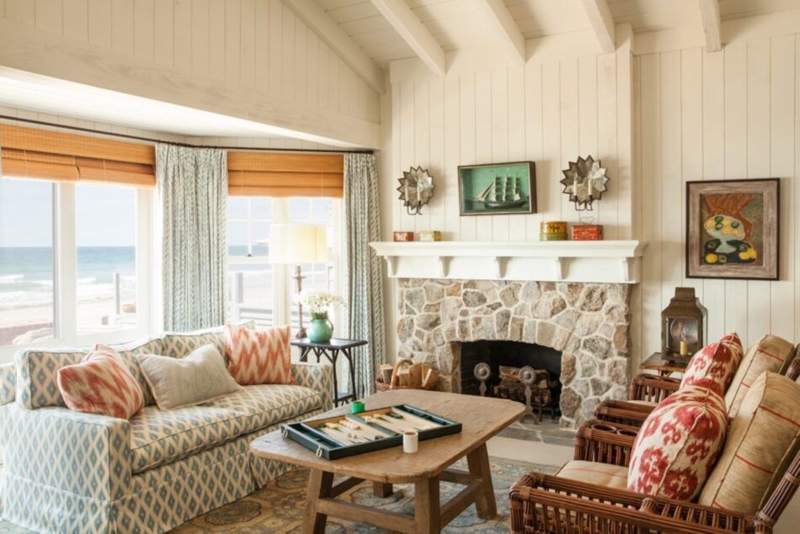 Coastal Living Room: Fieldstone Fireplace & Ikat Accent Pillows