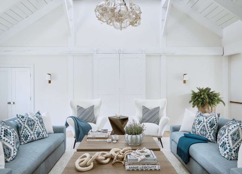Coastal Living Room Symmetrical Layout with Rope Wrapped Chandelier