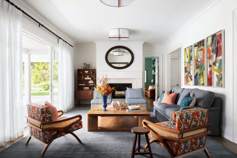 Coastal Modern Living Room: Abstract Triptych and Botanical Chairs