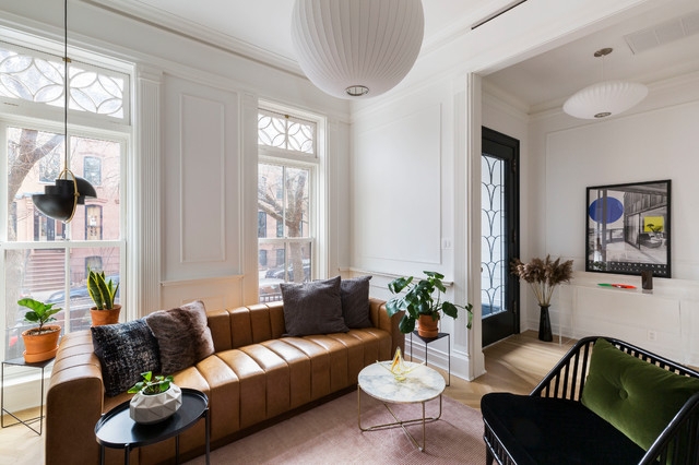 Contemporary Living Room with Tan Channel Tufted Sofa and Herringbone Floors