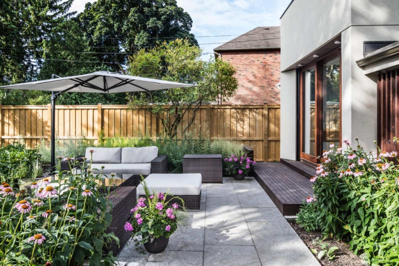 Contemporary Patio: Cantilever Umbrella & Stone Pavers