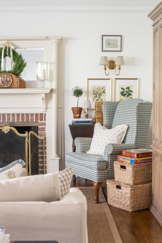Cottage Fireplace Reading Nook with Checkered Wingback Chair