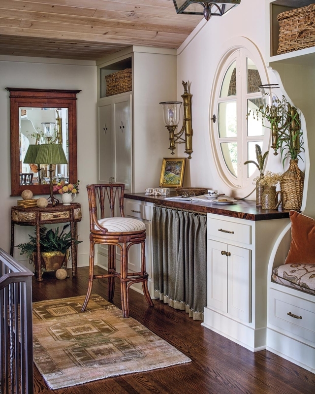 Cottage Home Office Nook with Unique Oval Window & Bamboo Stool