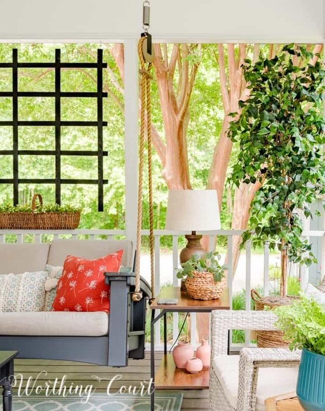 Cottage Porch with Thick Rope Suspension Swing & Black Grid Trellis.