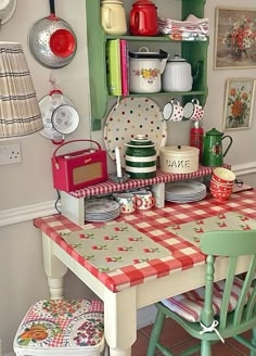 Cottagecore Dining Nook with Red Gingham Table and Mint Green Hutch